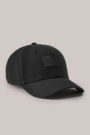 Charcoal grey sports cap with curved brim and black rubber patch logo, on neutral background.