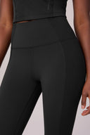 High-waisted charcoal compression leggings with mesh panels for activewear