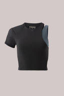 Charcoal granite cropped performance tee with mesh sleeve and asymmetrical design