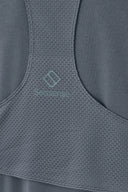 Close-up of textured gray athletic hoodie fabric with Seissense logo on mesh panel