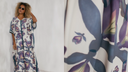 Woman in a loose, flowy dress with bold purple floral print, white background, close-up detail