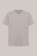 Light beige short sleeve crewneck basic tee shirt on plain background
