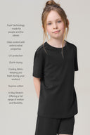 Girl wearing charcoal basic tee and shorts, featuring quick-dry, UV protection, and stretch fabric.