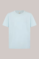 Light blue short sleeve basic t-shirt with crew neck on plain background
