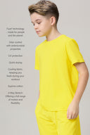 Boy wearing bright yellow short-sleeve tee and shorts with text highlighting fabric features such as odor control, UV protection, antimicrobial properties, and four-way stretch.