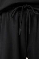 Close-up of charcoal boys' athleisure shorts with adjustable drawstring waist
