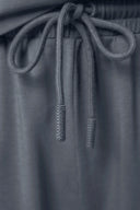 Close-up of granite gray boys' shorts drawstring with Seissense text detail