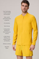 Man wearing a spicy mustard yellow men's endurance fitted athletic jacket and shorts