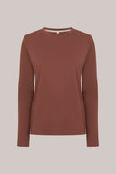 Sepia brown long sleeve activewear shirt with crew neck on plain background