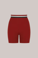 High-waisted merlot bike shorts with black and white striped waistband, athleisure apparel
