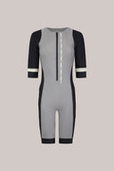 Grey and black short sleeve athletic romper with front zipper and white accents
