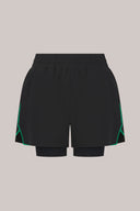 Charcoal athletic shorts with green accents and stretch waistband, front view on plain background